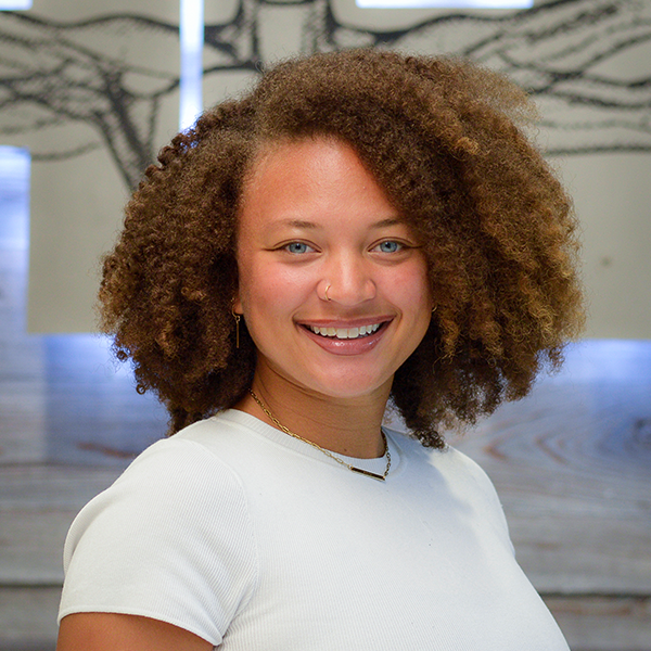 Morgan Smith smiles at the camera.