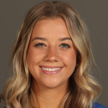 Cameron Hall smiles at the camera.