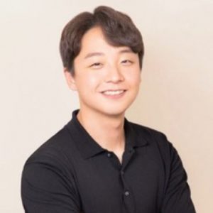 Junho Kim smiles at the camera.