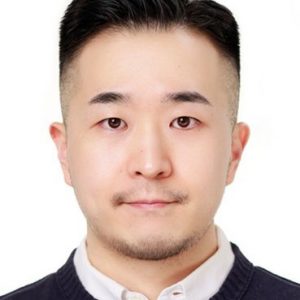 Tae Hoon Lee smiles at the camera.