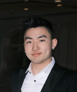 Leyi Shen smiles at the camera.
